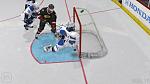Exelby slips the puck past...